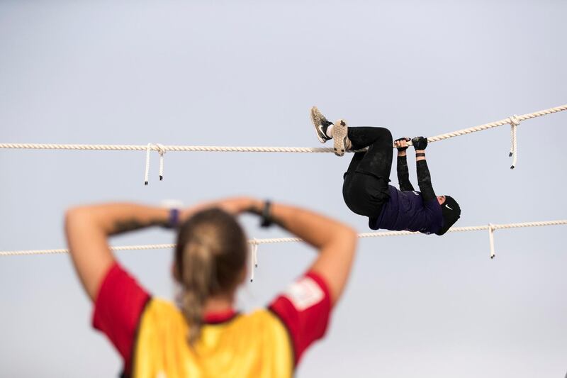 DUBAI, UNITED ARAB EMIRATES - MAY 9, 2018. 

Rope climbing challenge at the first day of Dubai Government Games begins, with female government employees taking part in multiple physical challenges.

Set in motion by the Crown Prince of Dubai,  Sheikh Hamdan bin Mohammed, the event sees teams of Government workers pitted against each other in a bid to be Gov Games champions.

The competition is held on Kite Beach.

(Photo by Reem Mohammed/The National)

Reporter: Nawal Al Ramahi
Section: NA