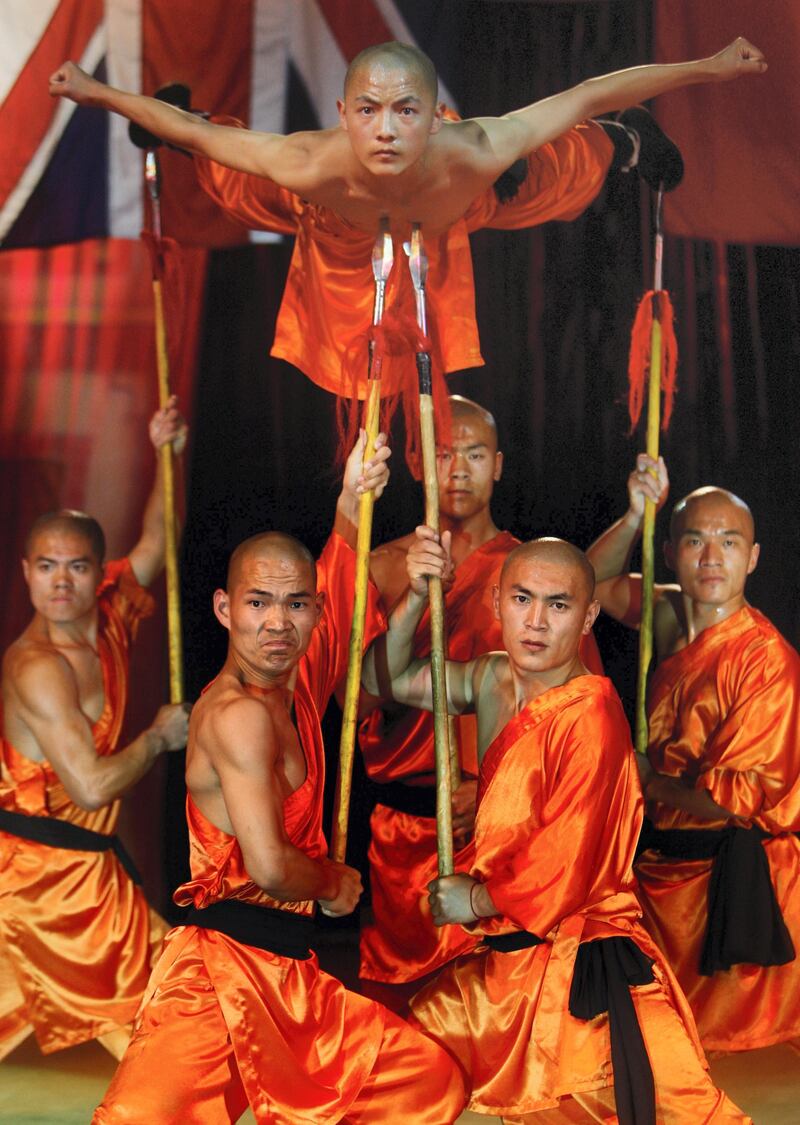 EDINBURGH, UNITED KINGDOM - AUGUST 06:  Shaolin Wu Shu warriors perform at the Chinese State Circus August 6, 2008 in Edinburgh, Scotland. A 2000 year old tradition of circus demonstrations by the Wu-Shu flying warriors and other traditional Chinese acts will be on display August 5 - August 25 during the Edinburgh Fringe Festival  (Photo by Jeff J Mitchell/Getty Images)