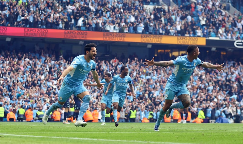 Manchester City's Ilkay Gundogan celebrates scoring the third goal in the 3-2 win against Aston Villa that secured City the Premier League title on May 22. Reuters