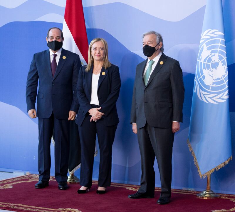 From left, Mr El Sisi, Ms Meloni and Mr Guterres pose for photographs at the start of Cop27. EPA