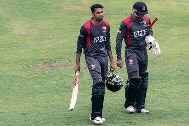 Qadeer Ahmed and Sultan Ahmed leave the field after the UAE were skittled out for 110 in the first ODI against Zimbabwe in Harare. Courtesy Zimbabwe Cricket
