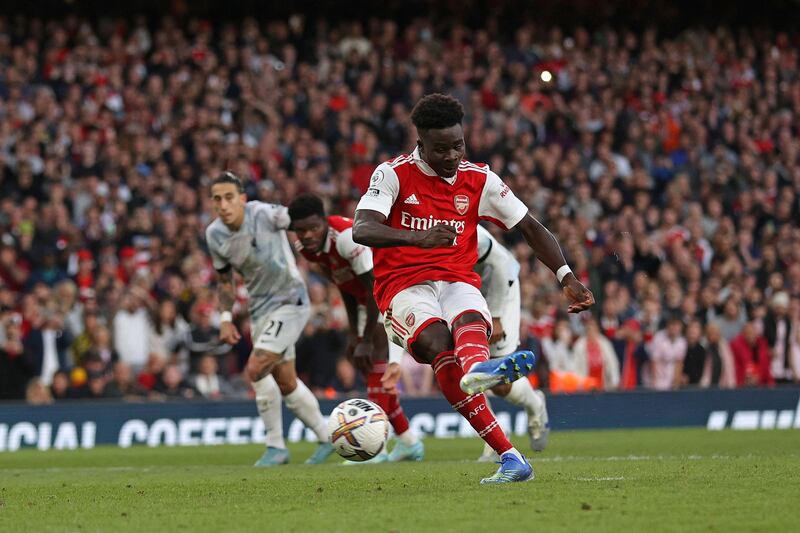 RW: Bukayo Saka (Arsenal). Arsenal’s main man at the age of just 21, Saka scored twice in the win over Liverpool, including a nerveless, match-winning penalty, and was always a danger. AFP