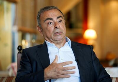 Carlos Ghosn gestures as he talks during an interview with Reuters in Beirut, Lebanon June 14, 2021.  Reuters