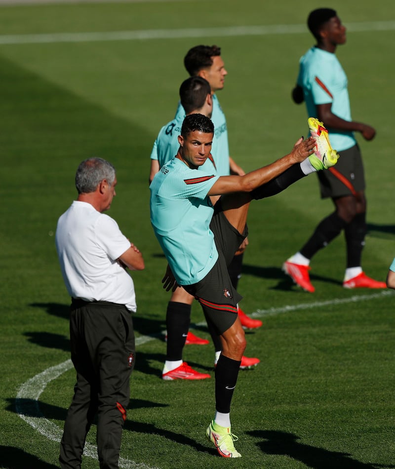 Portugal's Cristiano Ronaldo stretches during training. Reuters