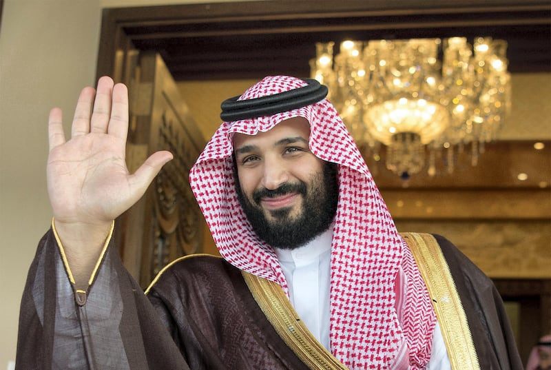 Saudi Deputy Crown Prince Mohammed bin Salman waves as he meets with Philippine President Rodrigo Duterte in Riyadh, Saudi Arabia, April 11, 2017. Bandar Algaloud/Courtesy of Saudi Royal Court/Handout via REUTERS ATTENTION EDITORS - THIS PICTURE WAS PROVIDED BY A THIRD PARTY. FOR EDITORIAL USE ONLY. - RC1C81A1FBC0