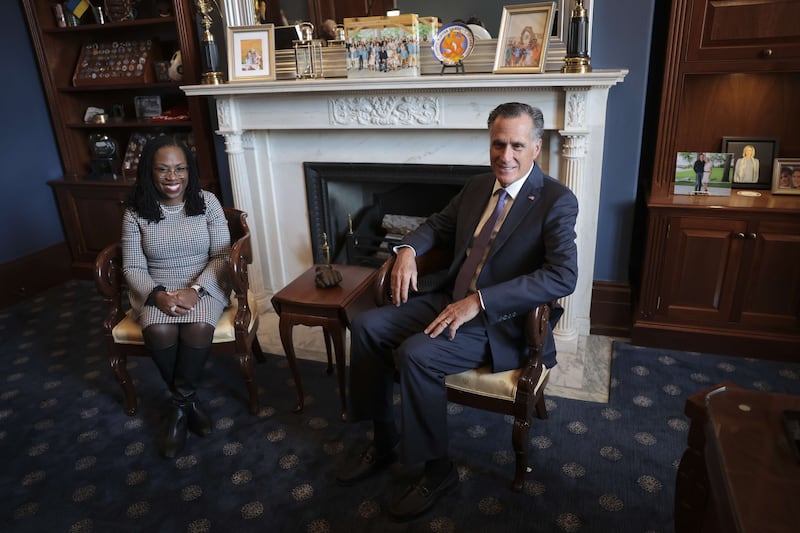 Ms Brown Jackson with Republican Senator Mitt Romney in late March.  Getty / AFP