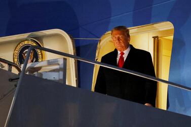 US President Donald Trump leaves Air Force One at Joint Base Andrews in Maryland, after visiting the US-Mexico border wall in Harlingen, Texas. Reuters