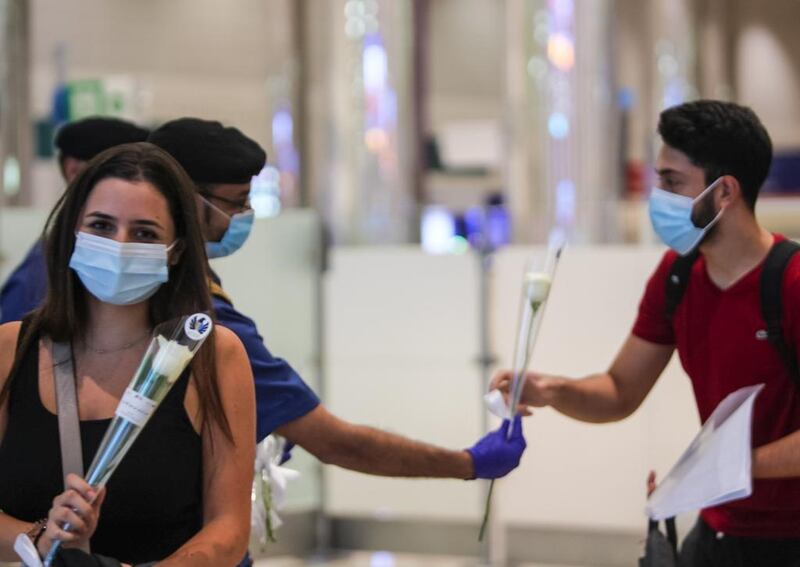 Passengers from Beirut were presented with flowers upon arrival at Dubai International Airport last night. Courtesy: Dubai Customs