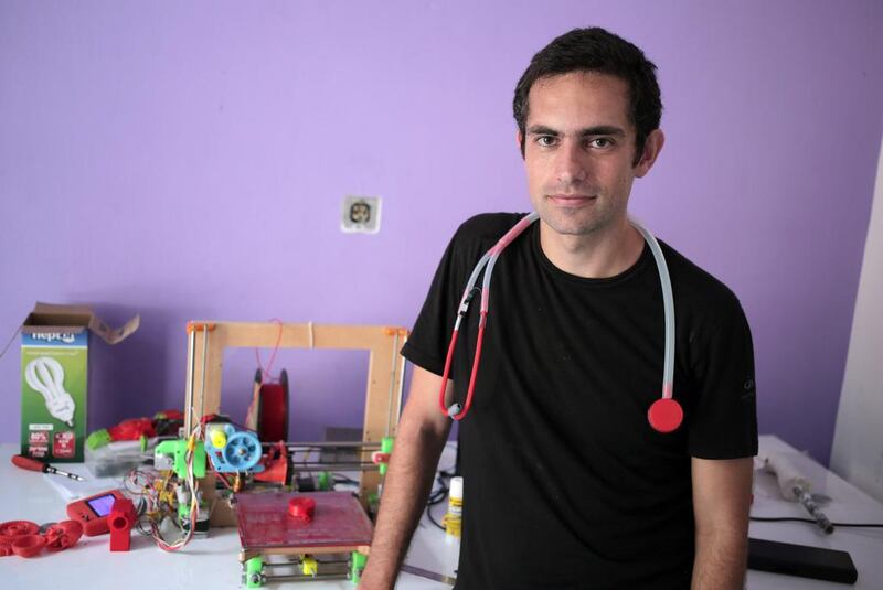Dr Tarek Loubani, a Palestinian-Canadian doctor, with a 3D printed stethoscope in Gaza City.  Khalil Hamra / AP Photo