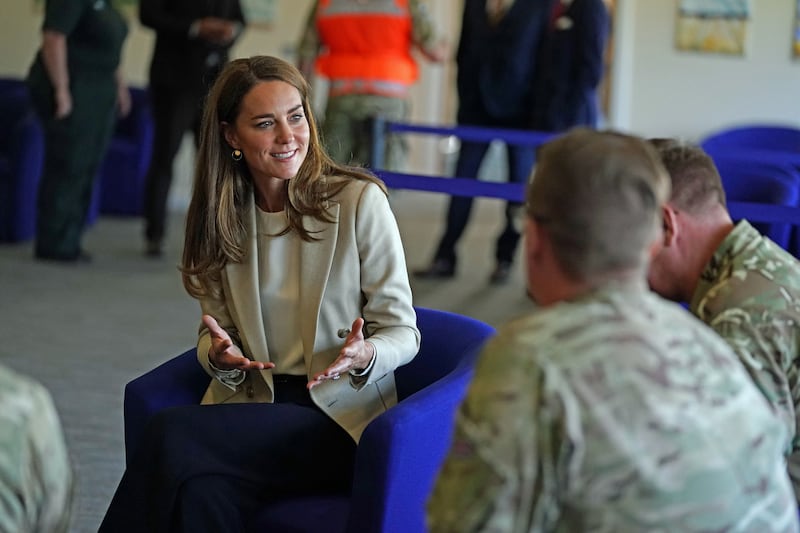 Catherine, Duchess of Cambridge, meets those who supported the UK's rescue of civilians from Afghanistan at RAF Brize Norton. Photos Getty Images