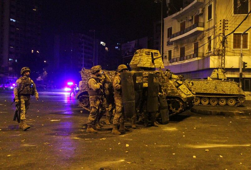 Army soldiers are deployed during clashes with demonstrators at a protest against the lockdown and worsening economic conditions, amid the spread of the coronavirus disease (COVID-19), in Tripoli, Lebanon. Reuters