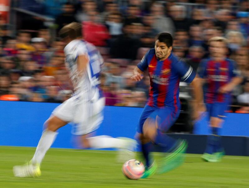 Barcelona’s Luis Suarez vies the ball. Albert Gea / Reuters