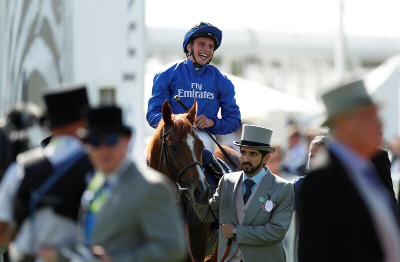 Horse Racing - Derby Festival - Epsom Downs Racecourse, Epsom, Britain - June 2, 2018   William Buick celebrates on Masar after winning the 4.30 Investec Derby   Action Images via Reuters/Andrew Boyers