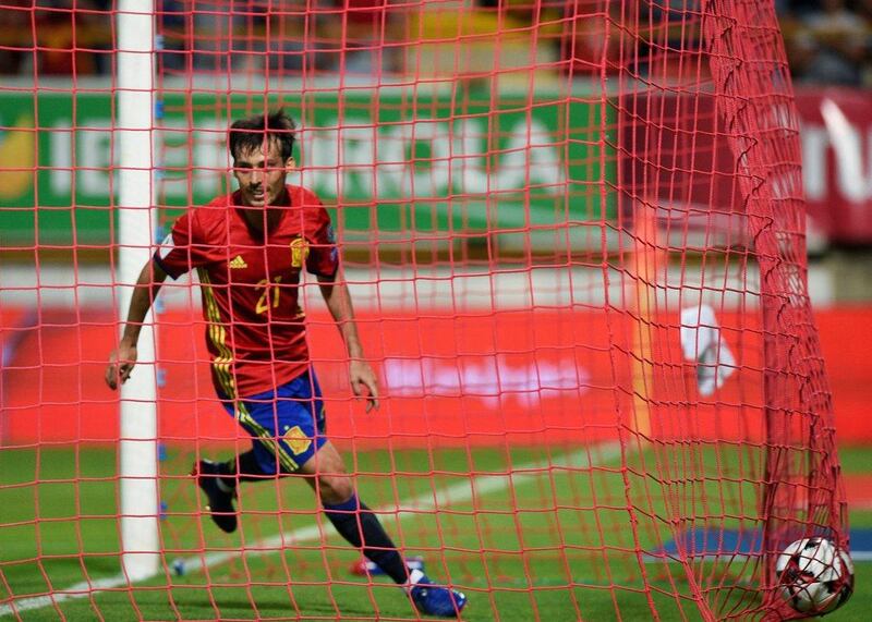 David Silva celebrates scoring for Spain against Liechtenstein. Eloy Alonso / Reuters