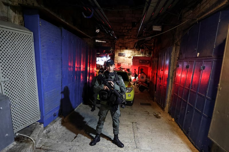 An Israeli policeman secures the area following an incident inside Jerusalem's Old City. Reuters