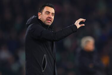 SEVILLE, SPAIN - FEBRUARY 01: Xavi, Head Coach of FC Barcelona, gives the team instructions during the LaLiga Santander match between Real Betis and FC Barcelona at Estadio Benito Villamarin on February 01, 2023 in Seville, Spain. (Photo by Fran Santiago / Getty Images)