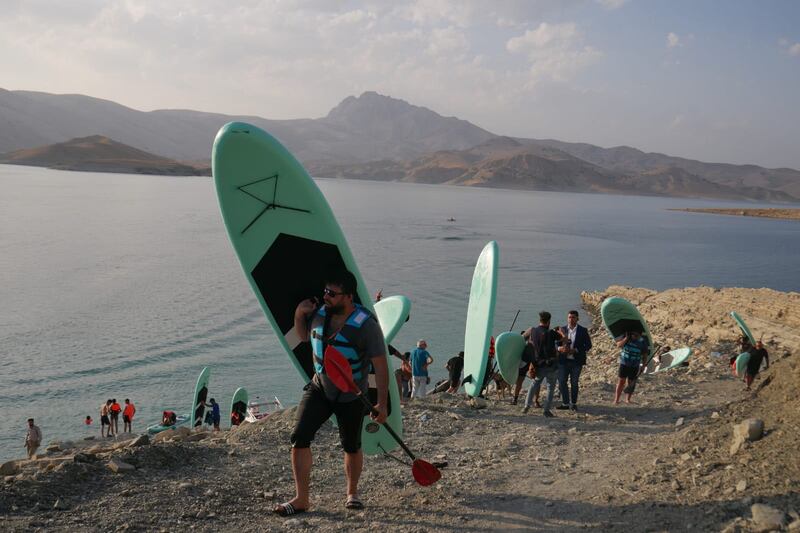 Getting ready for a paddleboarding trip. Photo: Nabil Musa