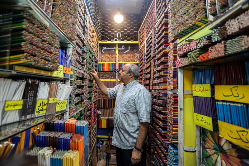 Rafi himself takes up much of the three-square-metre shop in the market's arts and crafts section, where he has welcomed generations of customers