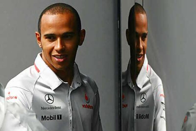 Lewis Hamilton leads the drivers' championship by 14 points from Jenson Button, his McLaren-Mercedes teammate, but both have failed to match the pace set by the Red Bull-Renaults.