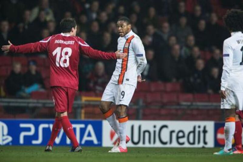 Shakhtar Donetsk forward Luiz Adriano is confronted by Nordsjaelland defender Michael Parkhurst after his controversial goal.