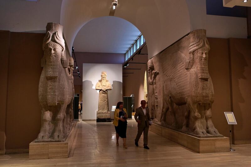 People visit the Assyrian Hall at the Iraq National Museum during International Museum Day, in Baghdad, Iraq.  AP Photo