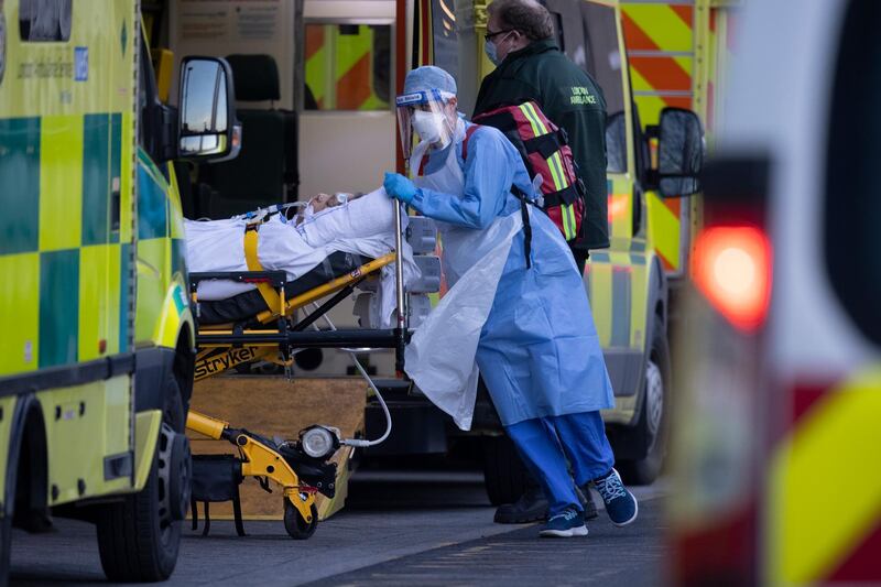 LONDON, ENGLAND - JANUARY 07: Patients arrive in ambulances at the Royal London Hospital, on January 05, 2021 in London, England. The British Prime Minister made a national television address on Monday evening announcing England is to enter its third lockdown of the covid-19 pandemic. This week the UK recorded more than 50,000 new confirmed Covid cases for the seventh day in a row.  (Photo by Dan Kitwood/Getty Images)