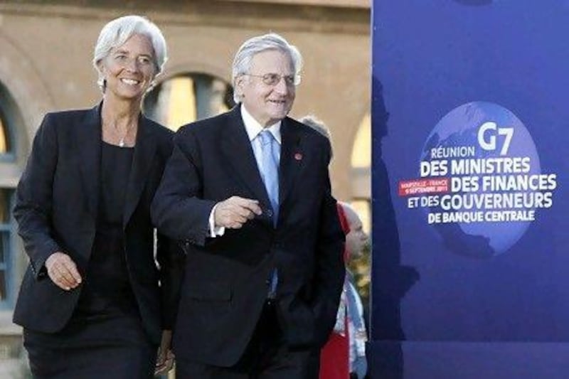 The IMF director Christine Lagarde and the European Central Bank president Jean-Claude Trichet joined the two-day summit in France. Jean-Paul Pelissier / Reuters