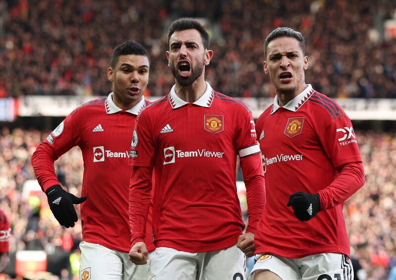 Manchester United's Bruno Fernandes celebrates levelling at 1-1 with Casemiro and Antony. Reuters