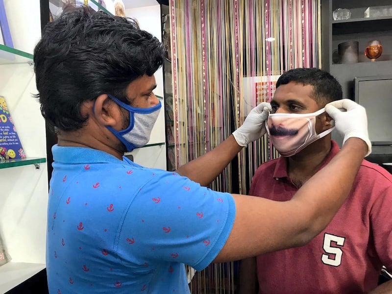 Binesh Paul, from Etumanoor in the south Indian state of Kerala, is using digital printing to customise protective masks by printing the buyer's face on them.Photos courtesy Binesh G Paul
