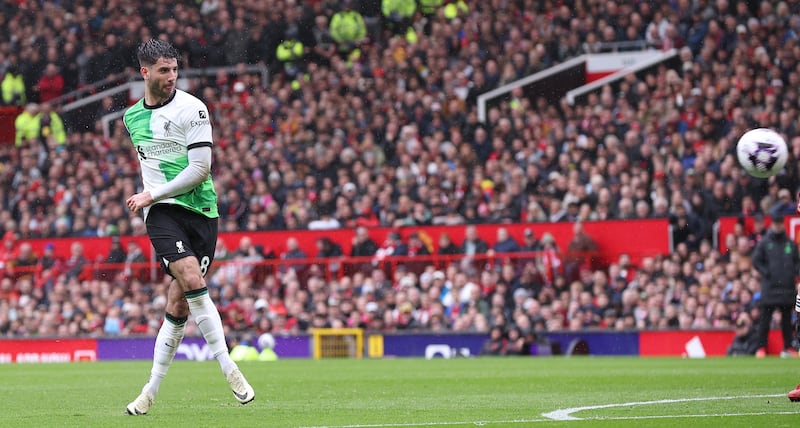 Liverpool's Dominik Szoboszlai shoots against Manchester United. EPA