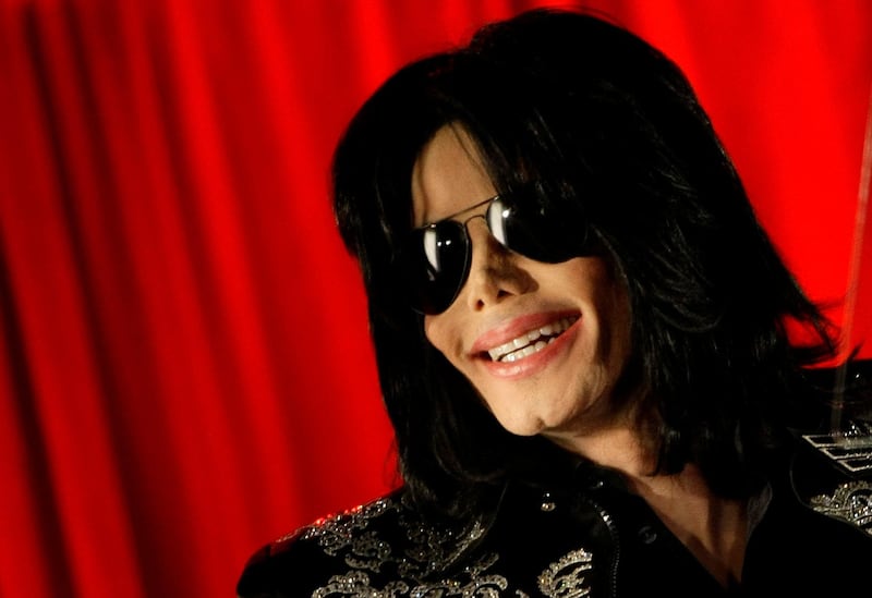 FILE PHOTO: U.S. pop star Michael Jackson gestures during a news conference at the O2 Arena in London, March 5, 2009.   REUTERS/Stefan Wermuth/File Photo