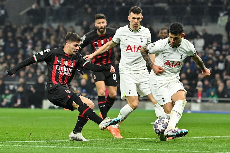 AC Milan's Brahim Diaz has a shot blocked by Tottenham  defender Cristian Romero. AFP