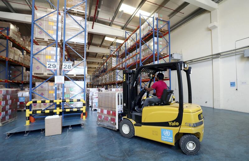 Dubai, United Arab Emirates - Reporter: Kelly Clarke. Aid is loaded onto a truck by the World health organization to support Beirut. Wednesday, August 5th, 2020. Dubai. Chris Whiteoak / The National