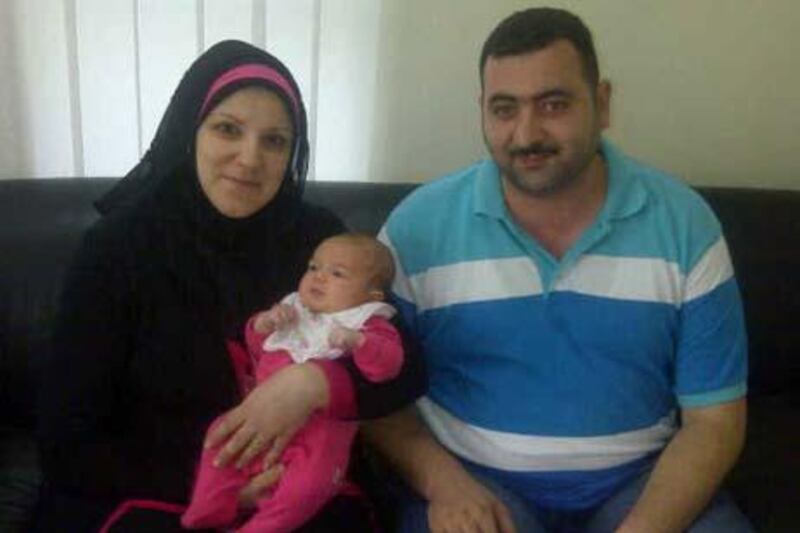 Provided photo of baby  Lailas and her parents 

 Courtesy Sharjah Police Department
