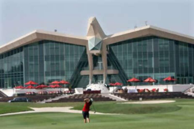 The view in front of the ninth hole at the falcon-shaped Abu Dhabi Golf Club is breath-taking and can distract anyone.