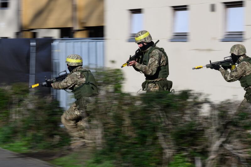 Ukrainian military personnel take part in the training exercise. 