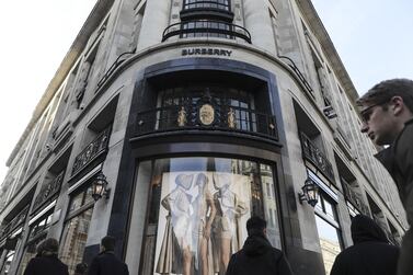 Pedestrians pass a Burberry fashion store in London. Yhe luxury fashion house scrapped its financial guidance for the year, warning that the coronavirus epidemic is cutting sales by three-quarters or more at stores in China. Bloomberg