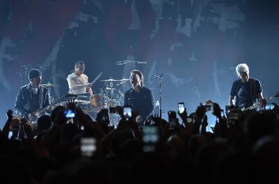 The Edge, left, Larry Mullen Jr., Bono and Adam Clayton of U2 perform during a concert at the Apollo Theater hosted by SiriusXM on Monday, June 11, 2018, in New York. (Photo by Evan Agostini/Invision/AP