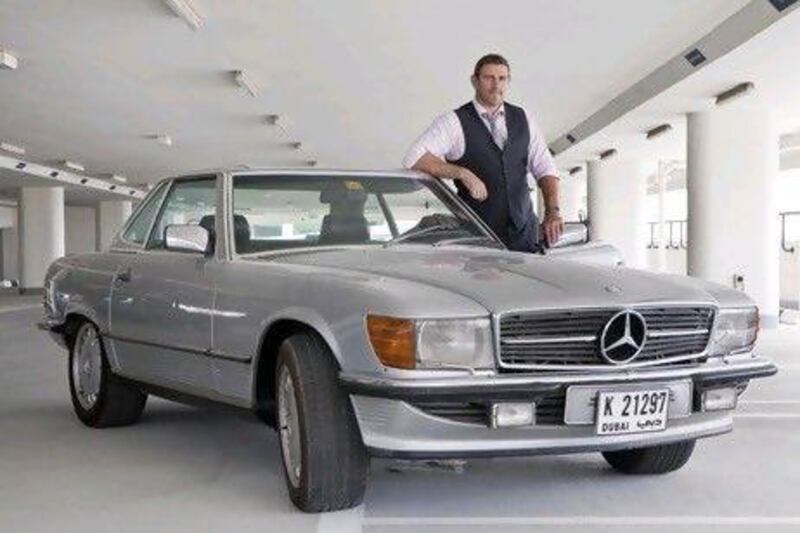 Scott Hutton is the proud owner of a 1985 Mercedes SL500. Antonie Robertson / The National
