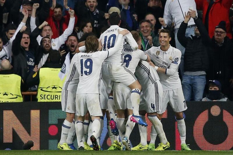 Real Madrid's Casemiro celebrates scoring their third goal with teammates. Susana Vera / Reuters