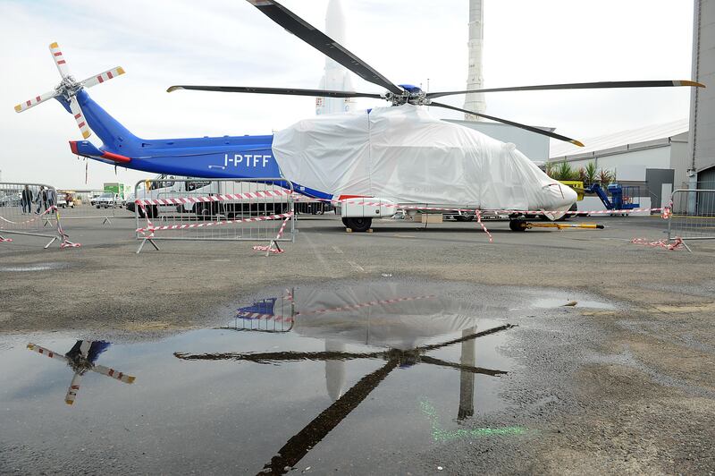 A  BELL 412EP helicopter sits on the tarmac at the Paris International Air Show -- June 14, 2013 -- . (Antoine Antoine for The National) *** Local Caption ***  Paris Air Show021.JPG