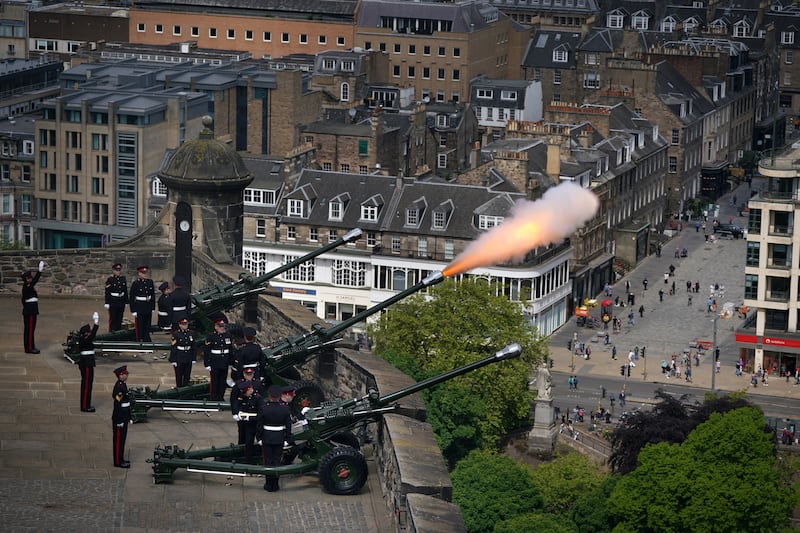 The 105th Regiment Royal Artillery, The Scottish and Ulster Gunners during the royal gun salute at Edinburgh Castle. PA