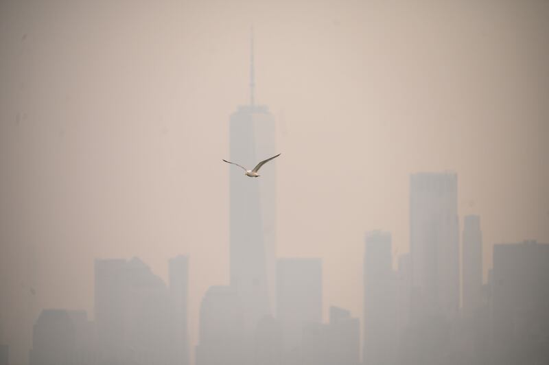 Heavy smog covers lower Manhattan. AFP