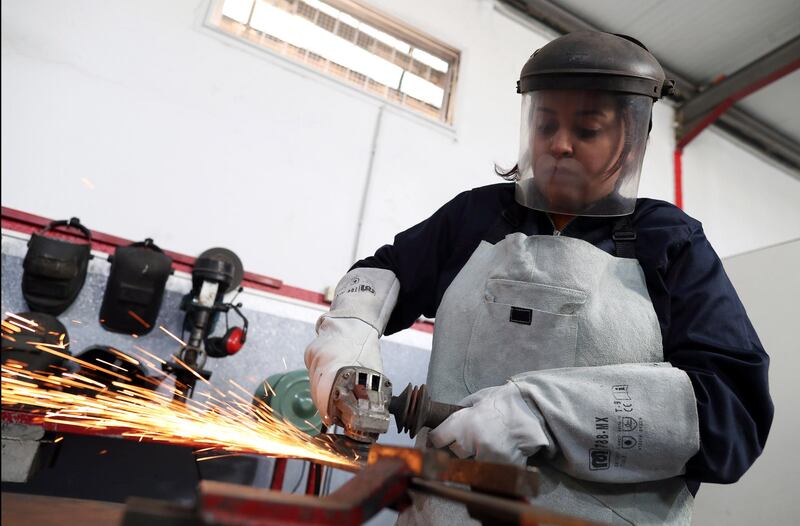 Ines Louihik, 26, takes part in a welding workshop in Tunis, Tunisia. She says: 'In 2019 I passed the welding exam. I was the only woman [along with] 35 men. It is very difficult to be accepted as a woman. Many people think that welding is hard work exclusively for men, but I have proven that women can be welders too and I am very proud of myself."  EPA
