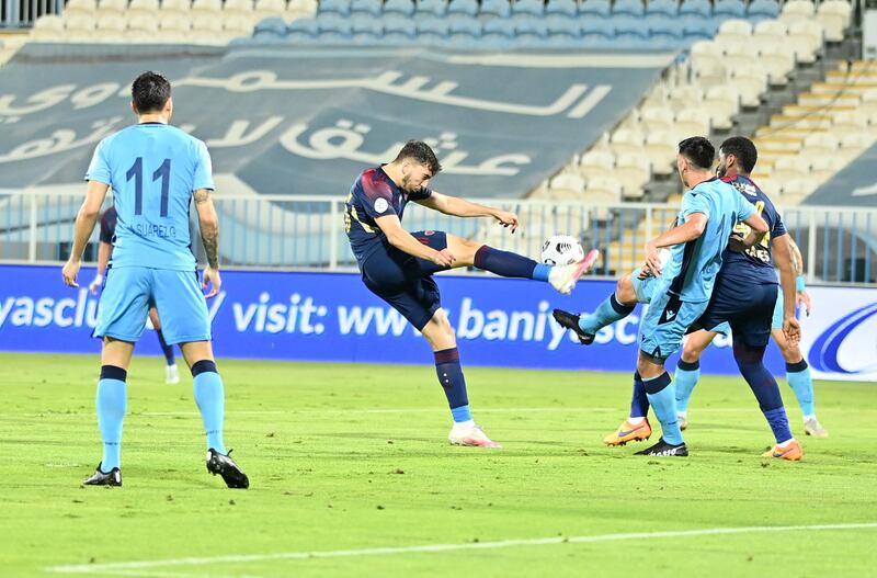 Action from Baniyas v Al Wahda in the Arabian Gulf League.