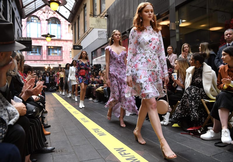 Models present outfits by Australian label Forever New.  AFP