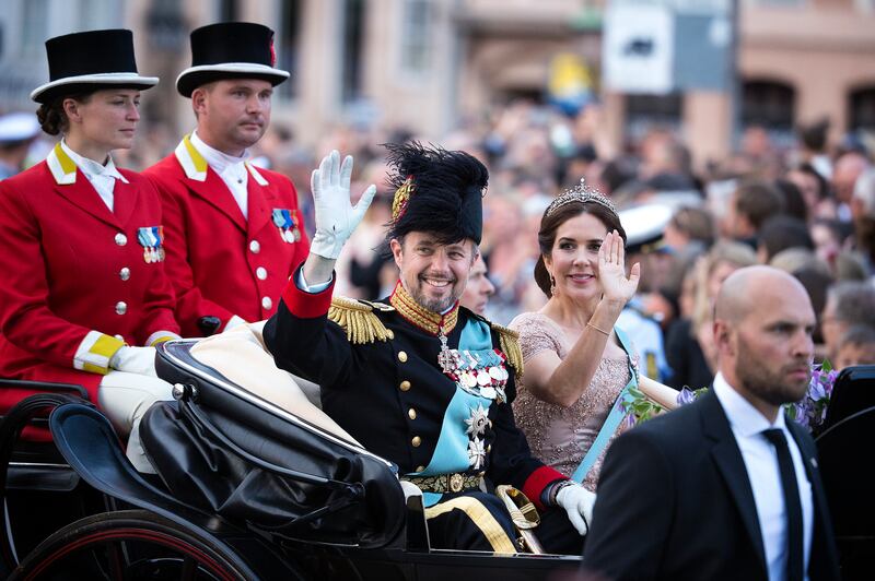Crown Prince Frederik and Crown Princess Mary arrive by carriage at Christiansborg Castle on the Crown Prince's 50th birthday in 2018. EPA