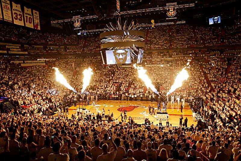 Pyrotechnics shoot off in the pre-game moments  before the first half of Game 1 of basketball's NBA Finals between the Miami Heat and the San Antonio Spurs, Thursday, June 6, 2013 in Miami. (AP Photo/Wilfredo Lee)