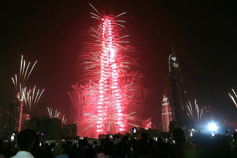 DUBAI, UNITED ARAB EMIRATES - Fireworks explode over Downtown Dubai to ring in 2017 in Dubai.  Satish Kumar /The National *** Local Caption ***  na01ja-pg1-BurjKhalifa.jpg