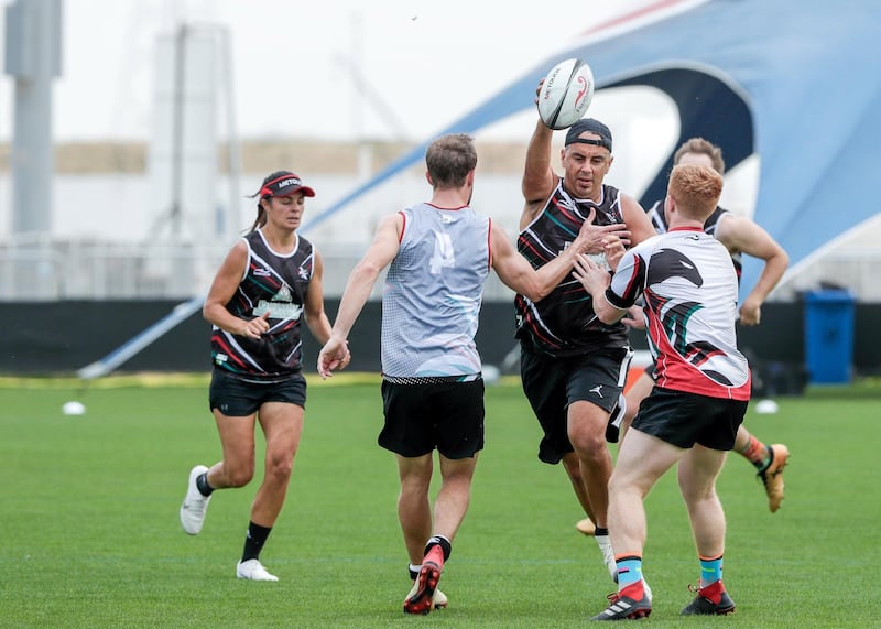 Abu Dhabi, April 13, 2019.  Middle East Touch preparing to play at the World Cup of rugby's non-contact version.  -- John Larkins in action. 
Victor Besa/The National.
Section:  SP  
Reporter:  Paul Radley